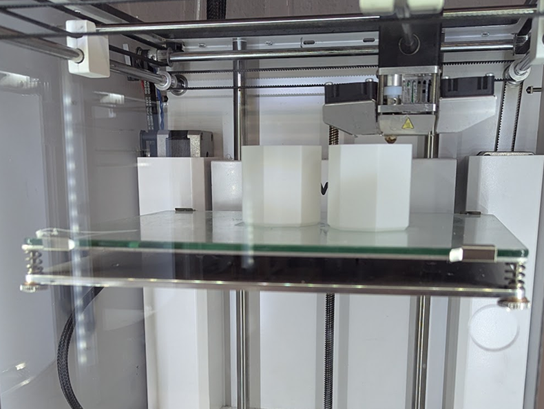 Photo of the final prints for the prototype. These prints are made of opaque fillament instead of the off white to diffuse the light a bit better